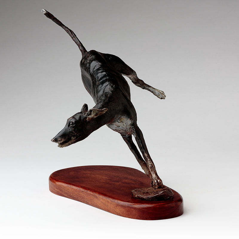 Bronze sculpture running whippets