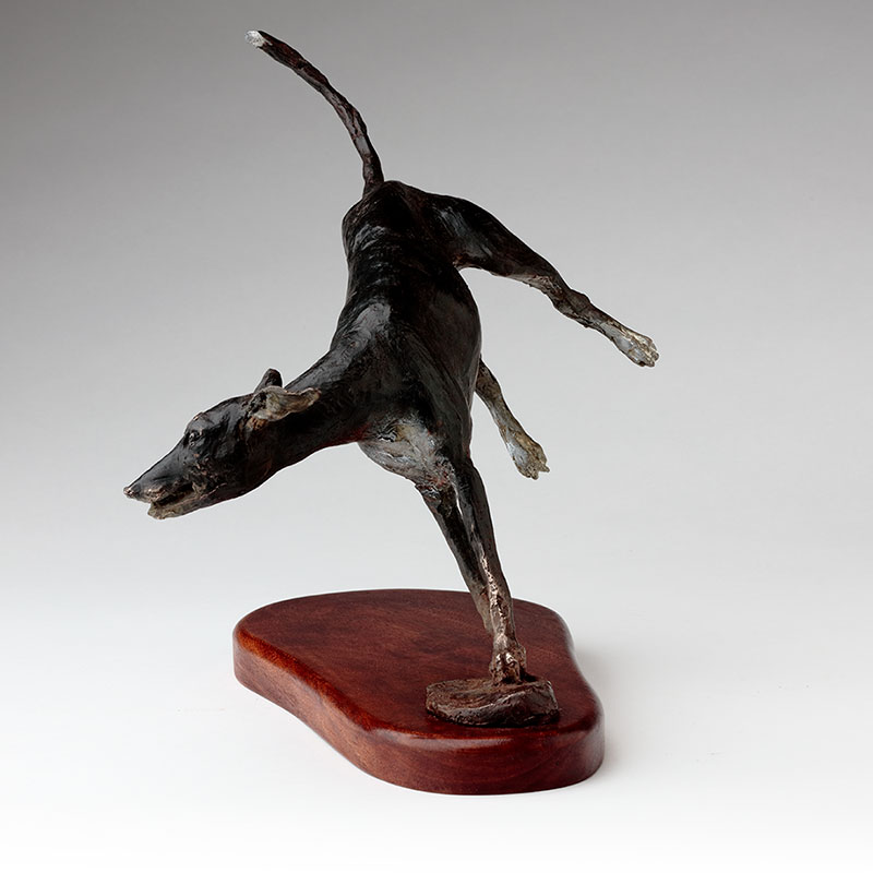 bronze sculpture running whippets